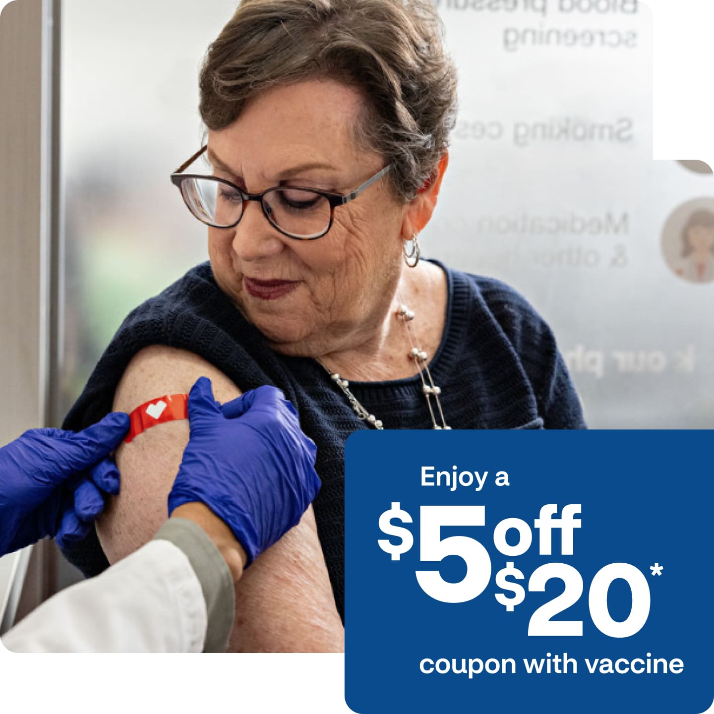 Older woman getting vaccinated at a CVS clinic. Enjoy a $5 off $20 coupon with vaccine. Restrictions apply.